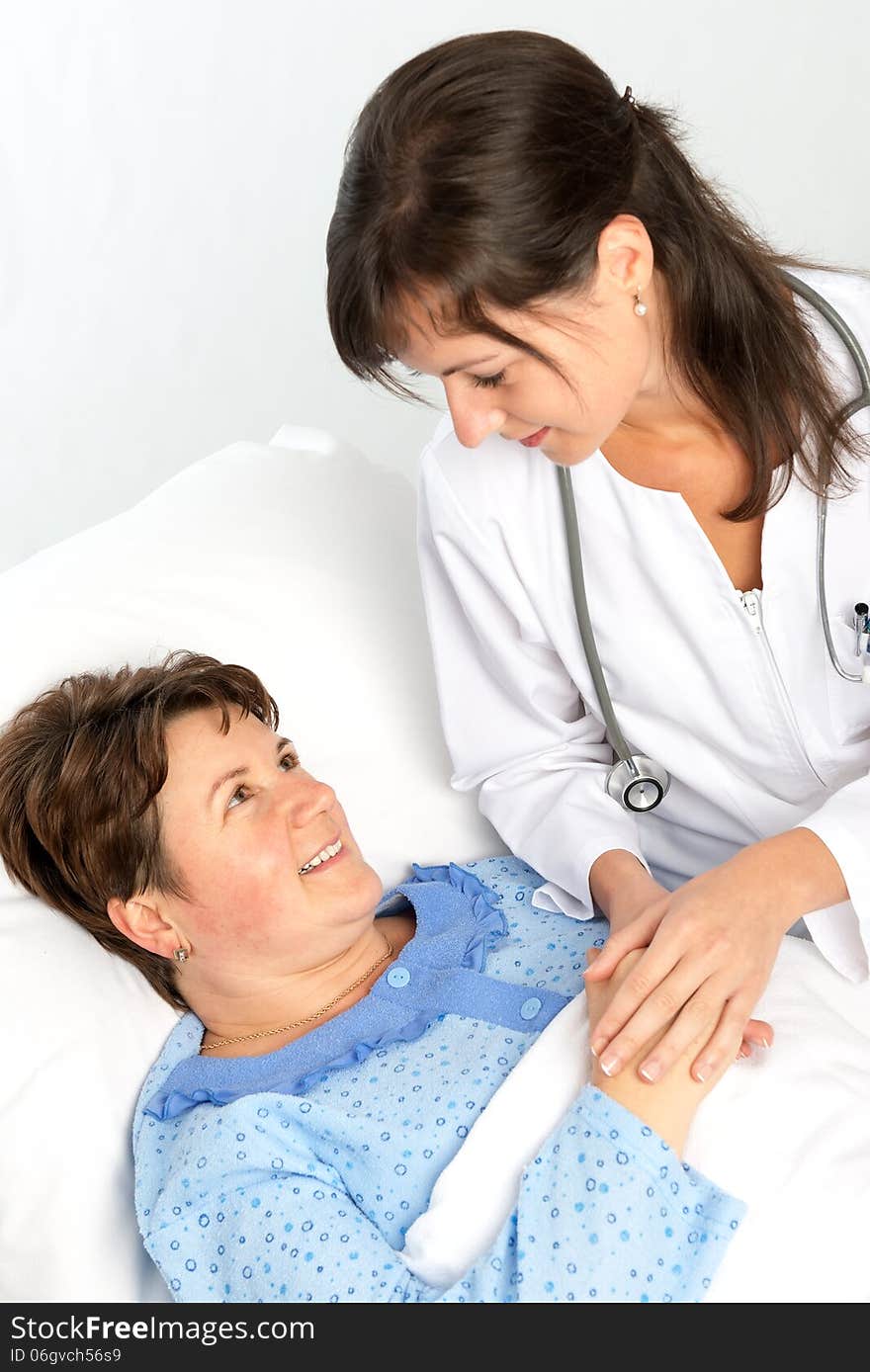 Nurse cares for a elderly woman