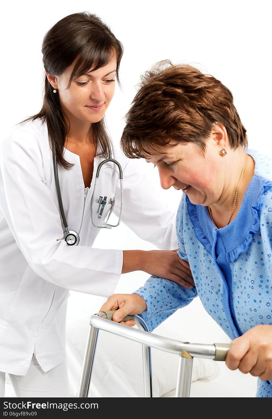 Nurse helps a senior woman