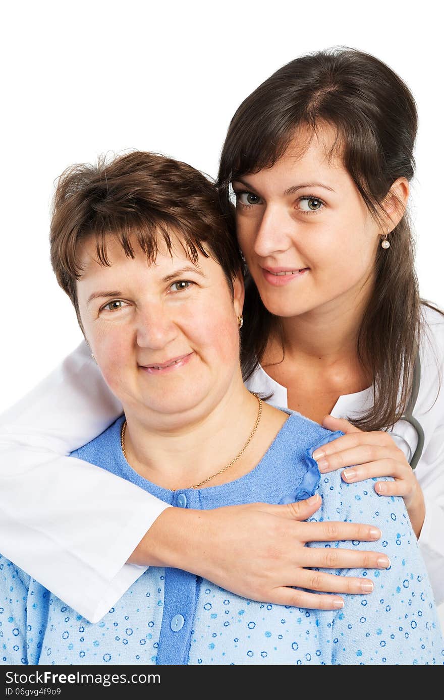 Nurse with patient smiling on white