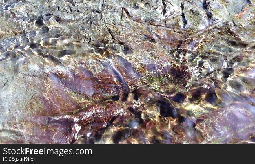 Water Running Over Rock Background