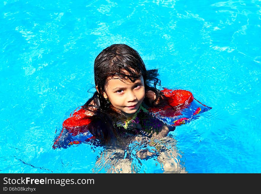 Smiling Girl Looking At The Camera