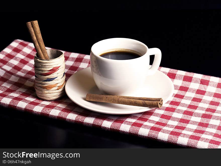 White coffee cup with cinnamon