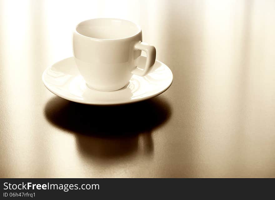 Espresso white cup and plate on table. Espresso white cup and plate on table