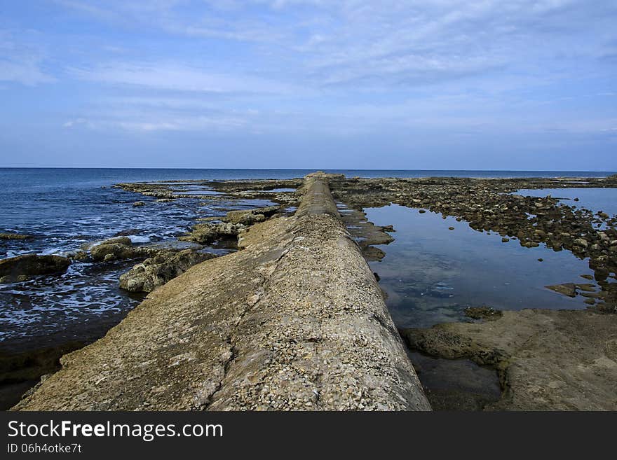 Sewage pipe having their outlet right into the sea pollution the water.