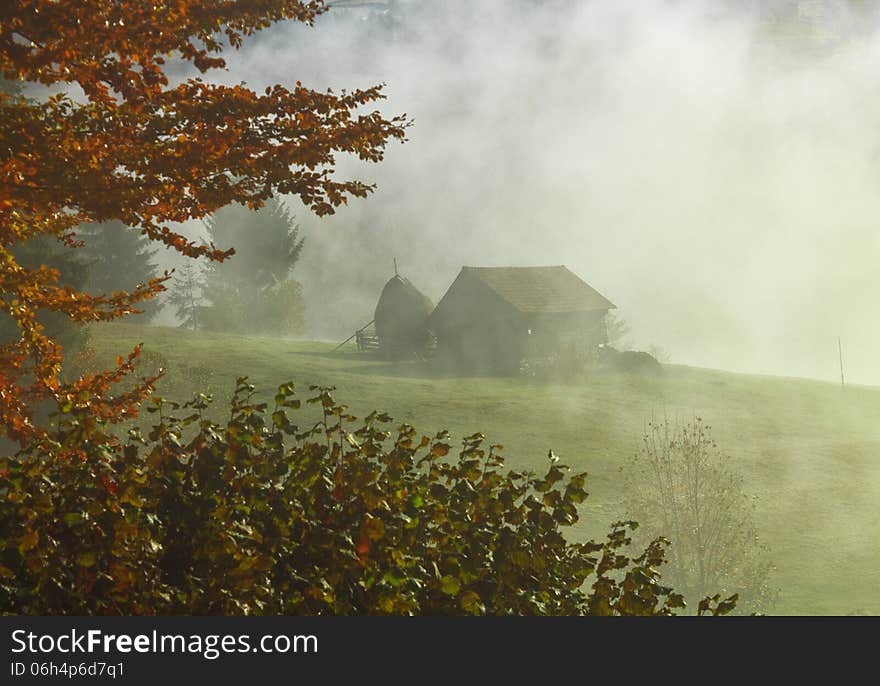 Foggy morning sunrise landscape in Transylvania