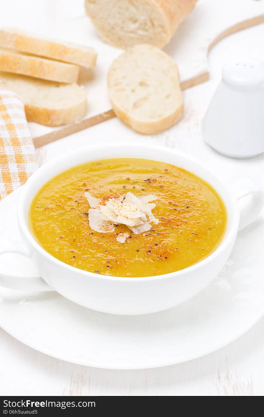 Cream soup of yellow lentils with vegetables, vertical