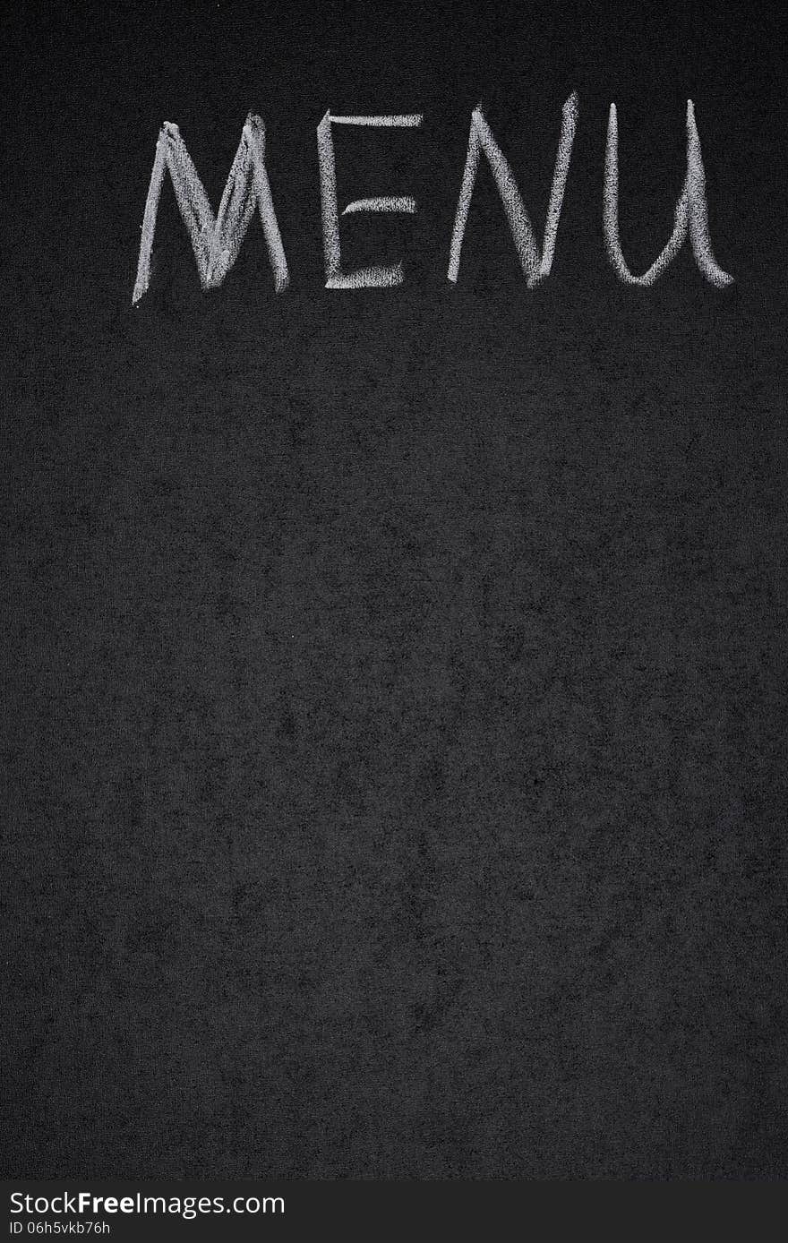 Menu title is written white chalk on a blackboard, vertical