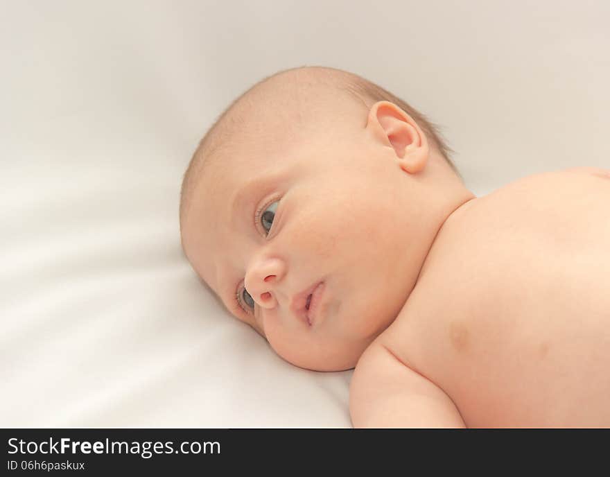 Photographed on a white baby before a dip. Photographed on a white baby before a dip