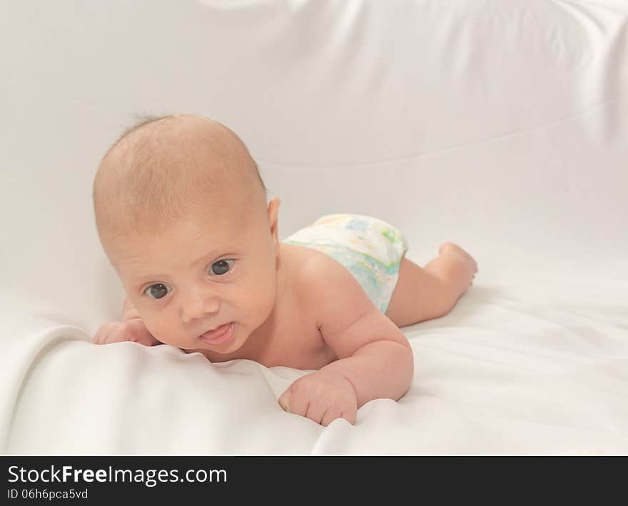 Photographed on a white baby before a dip. Photographed on a white baby before a dip