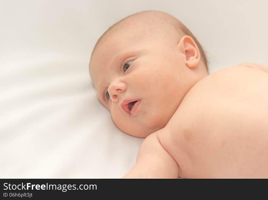 Photographed on a white baby before a dip. Photographed on a white baby before a dip