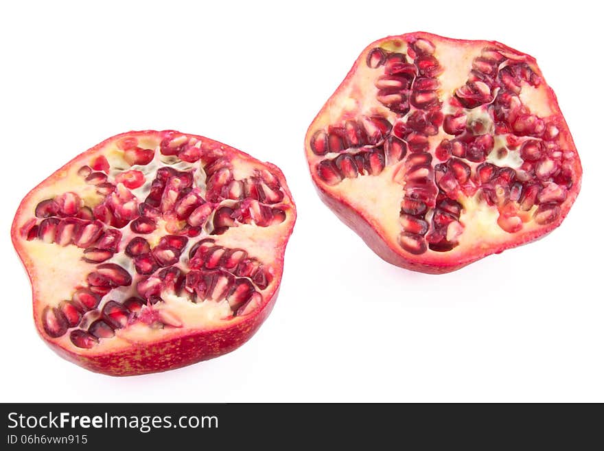 Pomegranate cross section isolated on white background