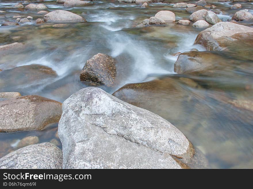 Beautiful river flow over the stone. Beautiful river flow over the stone