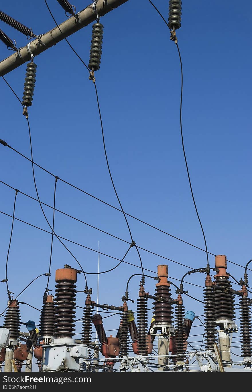 Electric coils and equipment at a transformation station. Electric coils and equipment at a transformation station