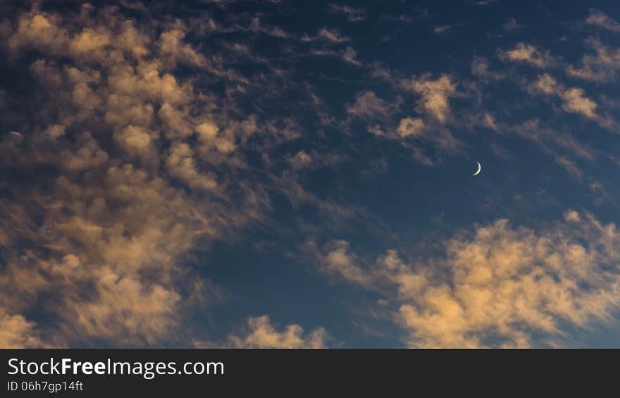 Crescent moon at sunset