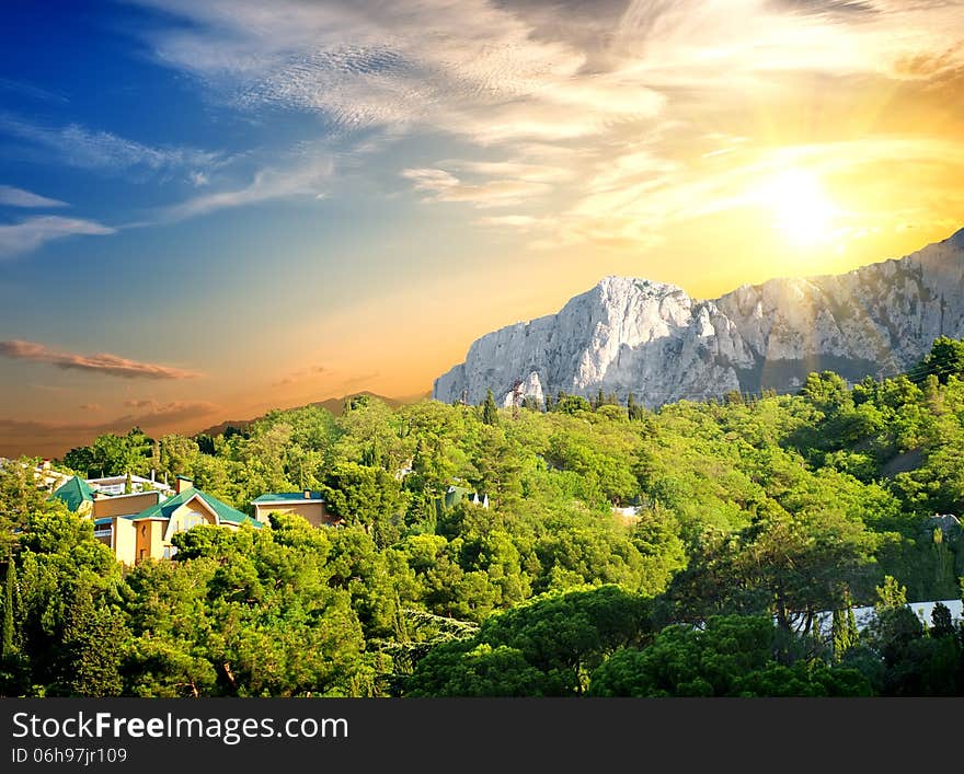 Sunset over the village in the mountains