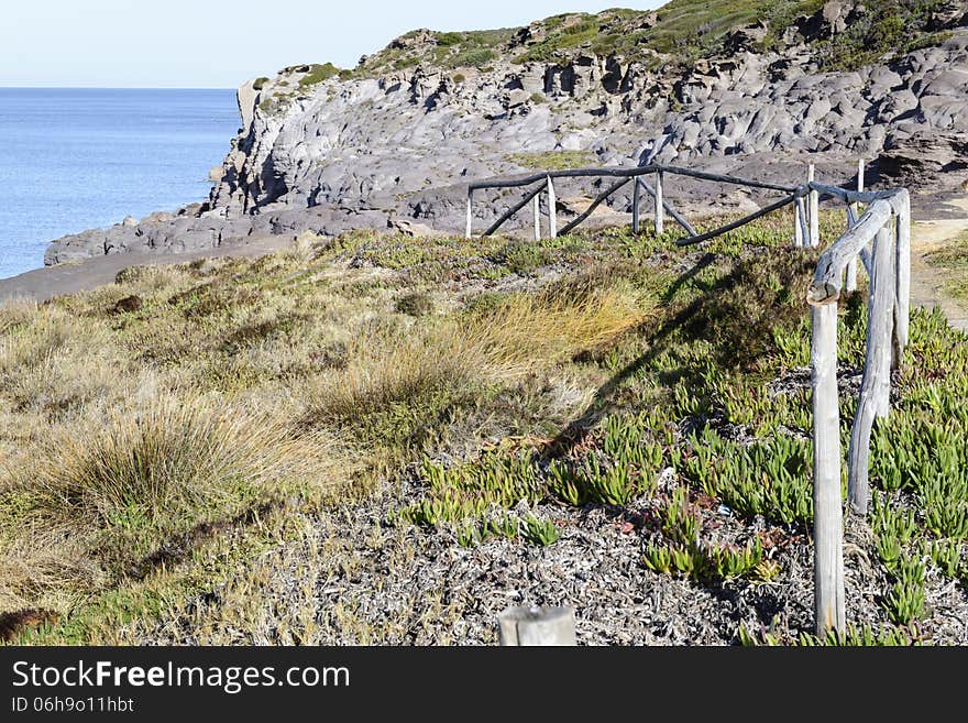 Natural area protected by a fence along the south west coast of Sardinia.