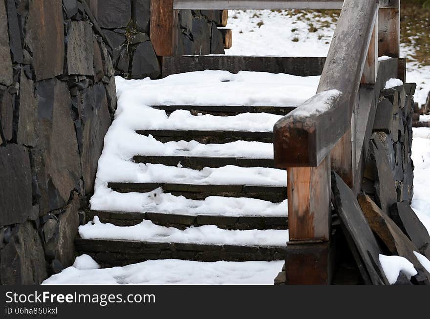 Stairs covered by snow