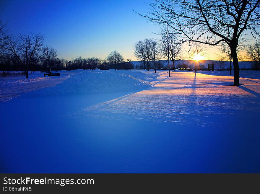 Sunset in the winter park