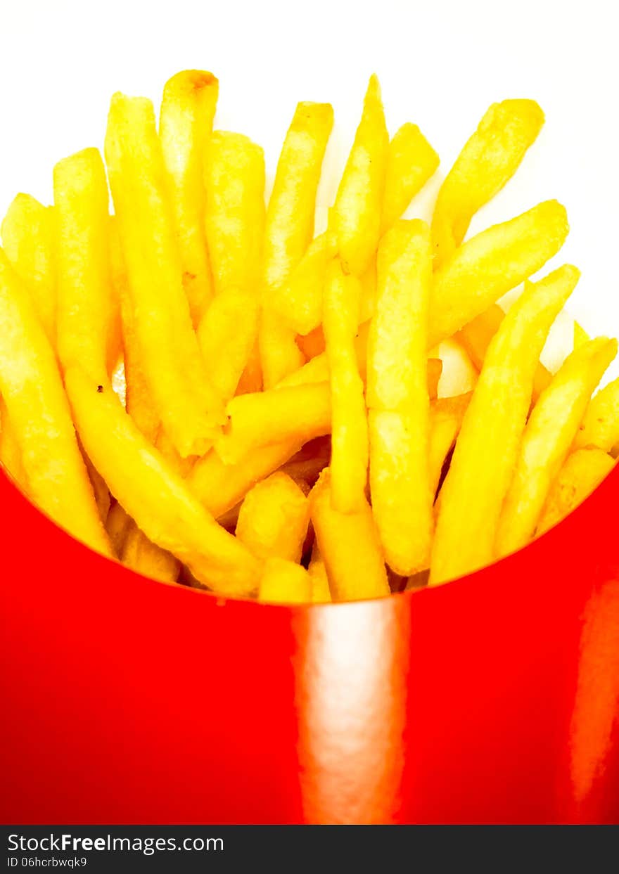 Portion of French fries in a red box