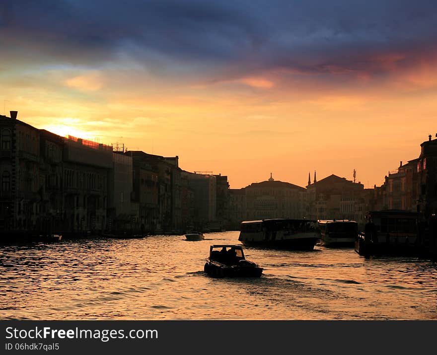 Sunset of the Grand Canal viewed from the Rialto bridge in Venice. Sunset of the Grand Canal viewed from the Rialto bridge in Venice