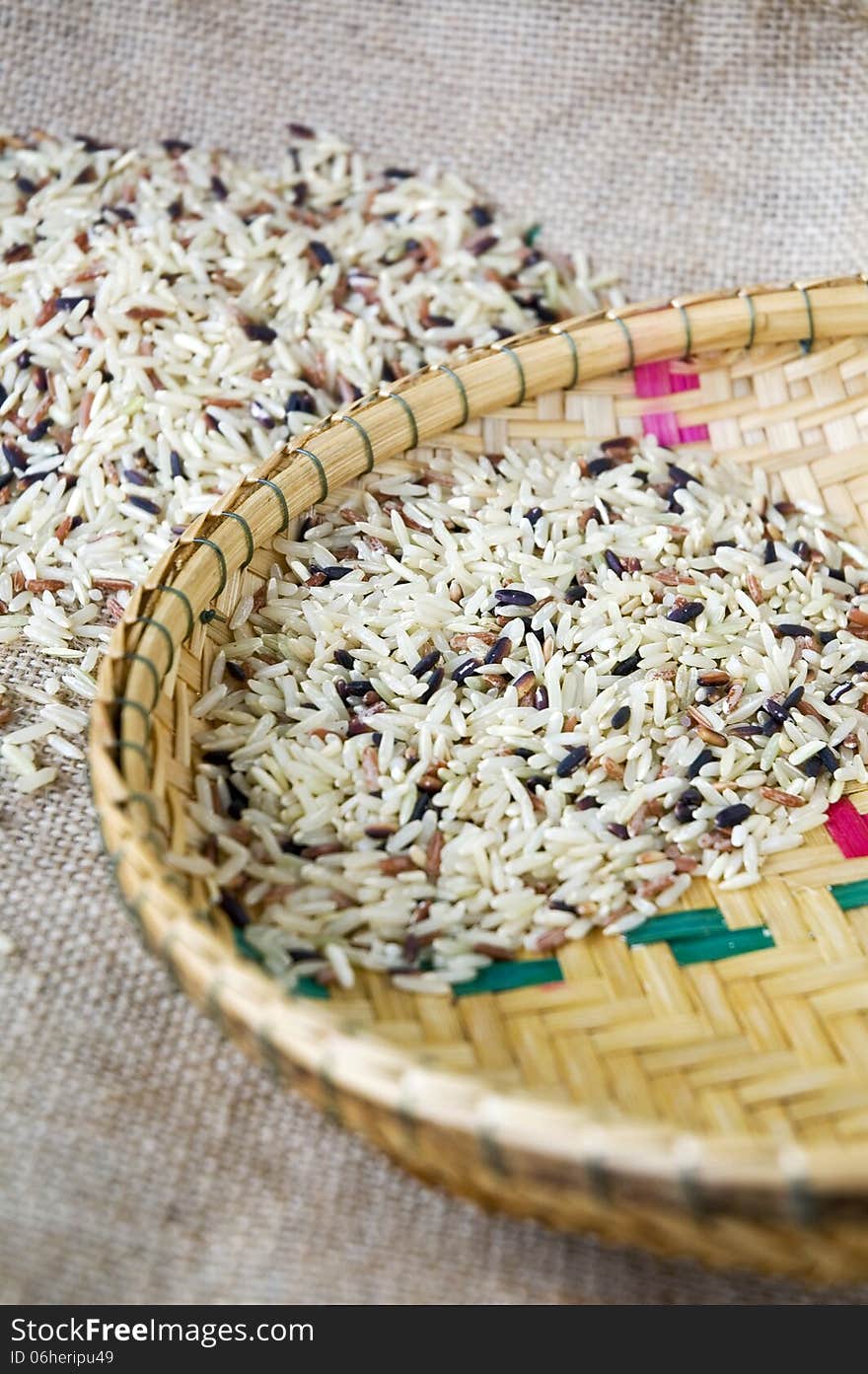 Variety of brown rice in basket