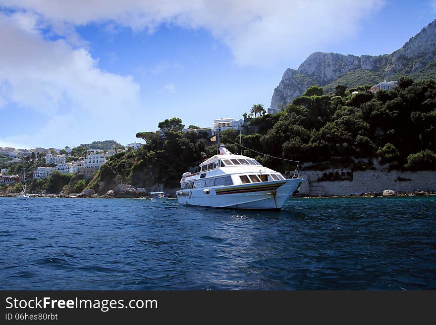 Yacht anchored in the north coast of Capri island in Italy. Yacht anchored in the north coast of Capri island in Italy