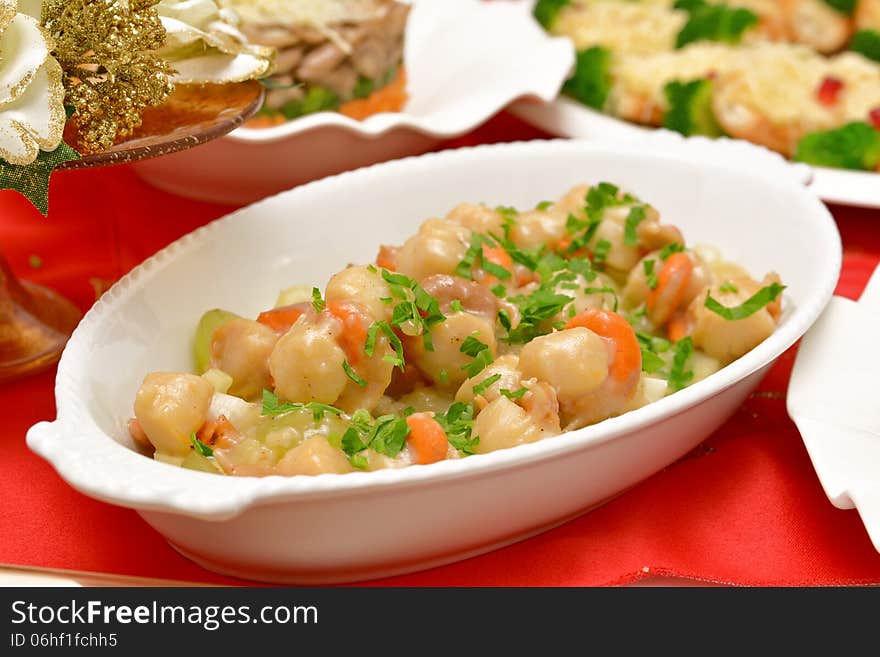 Dish of scallops and shrimp with fresh herbs