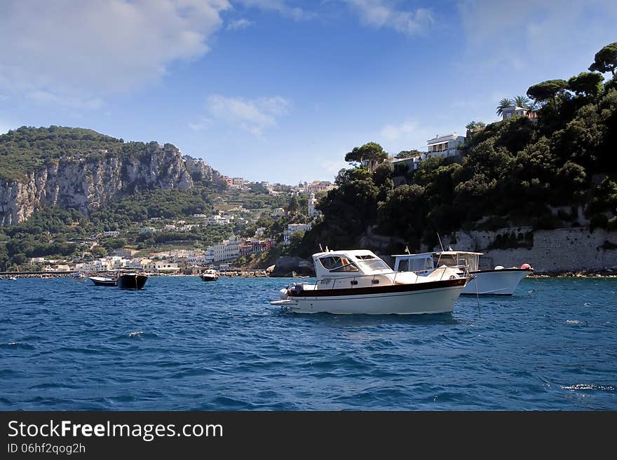 Yachts anchored in the north coast of Capri island in Italy. Yachts anchored in the north coast of Capri island in Italy