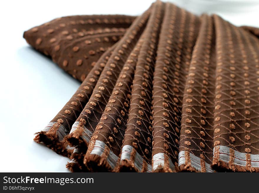 Image of fabric laying on a table in a studio