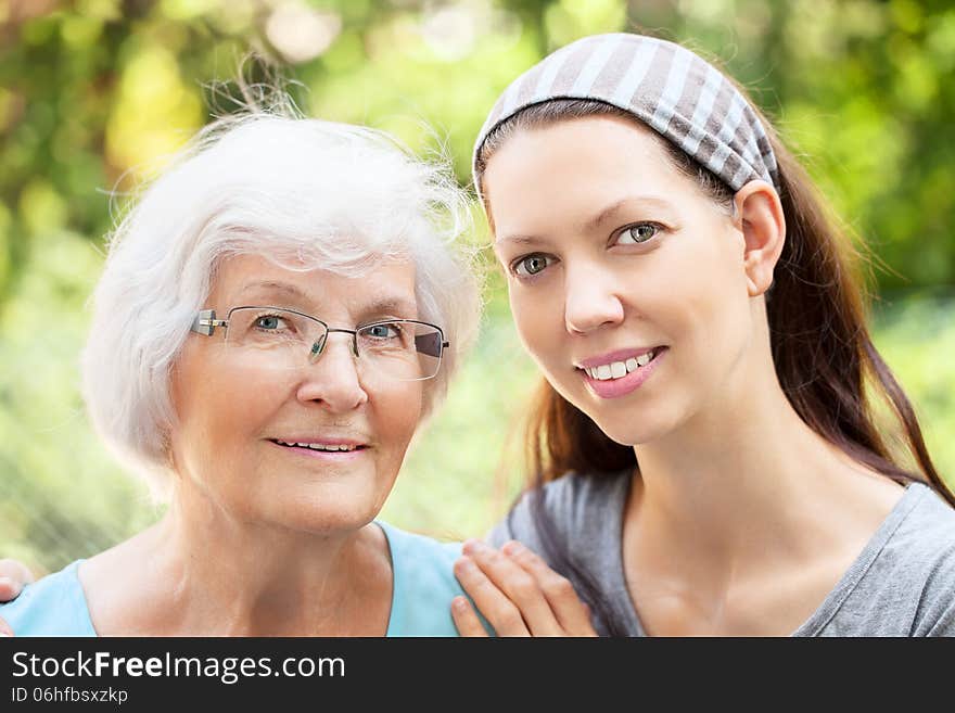 Happy senior women portrait together with granddaughter. Happy senior women portrait together with granddaughter