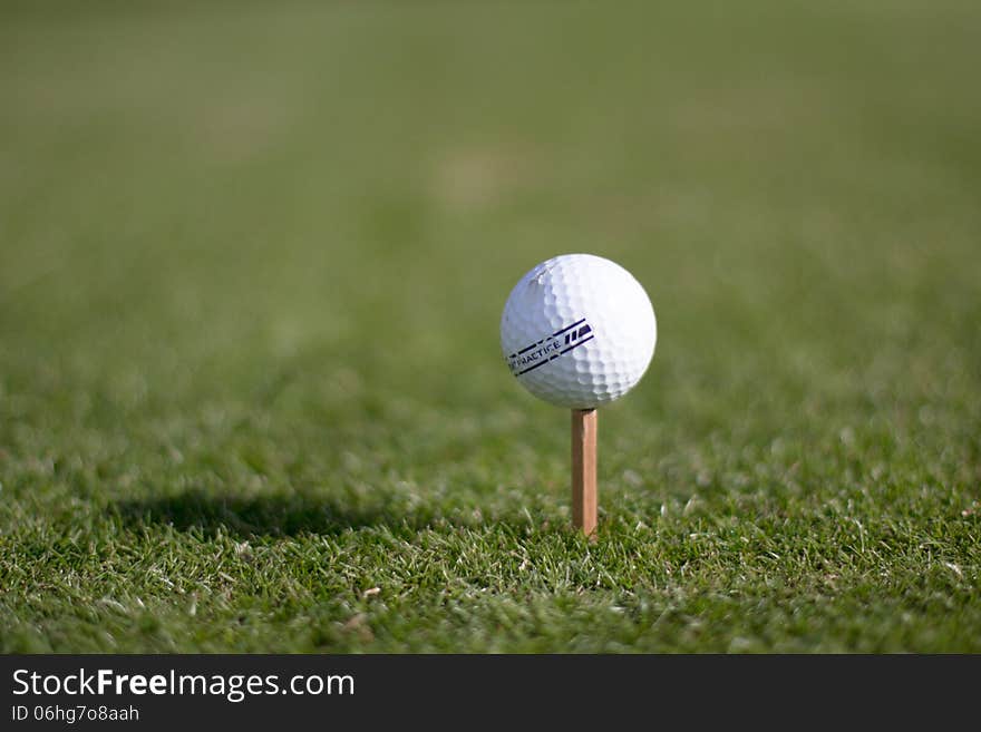 A golf ball on an unusual tee