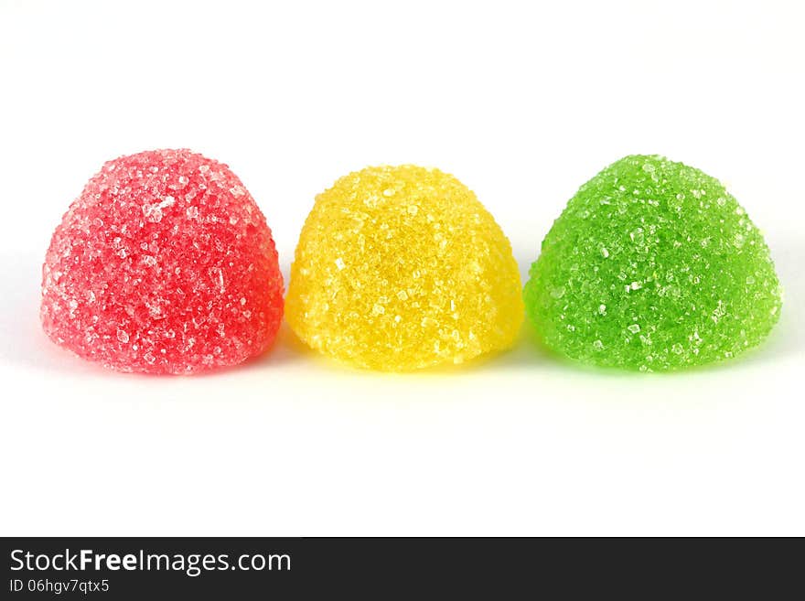 Delicious sweet multicolored different marmalade on white background. Delicious sweet multicolored different marmalade on white background