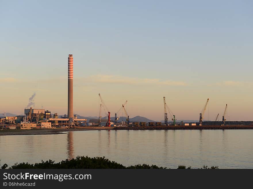 Industrial harbor at sunset.