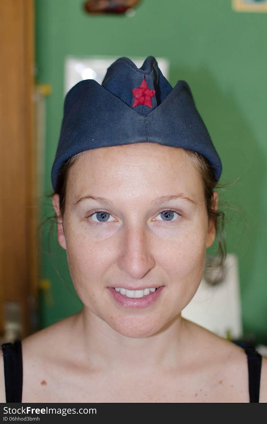 Girl with a red star hat