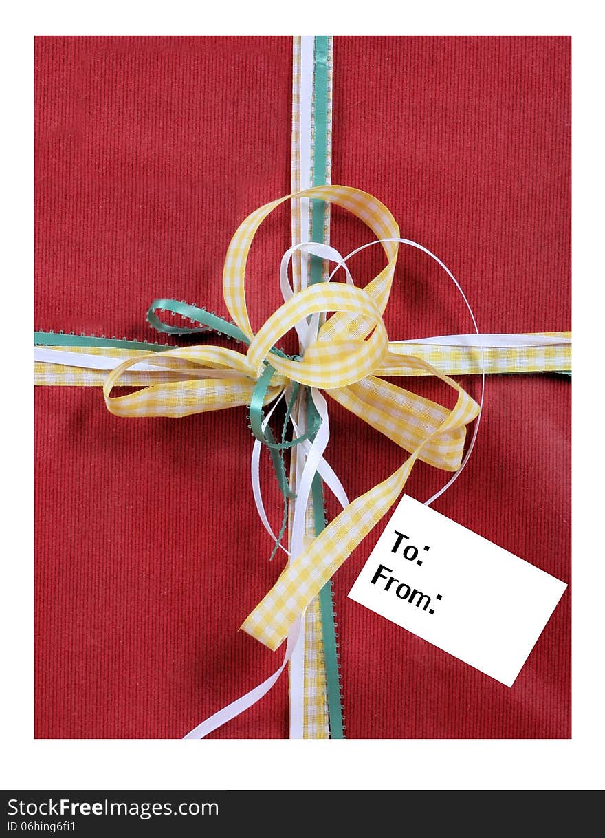 Gift With Bows And An Empty Tag With Room For Your Text