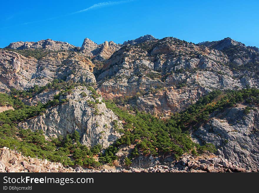 Coastal cliffs, coastline, rocky shore, the view from the sea side, Crimea peninsula, Ukraine, Black Sea Coast