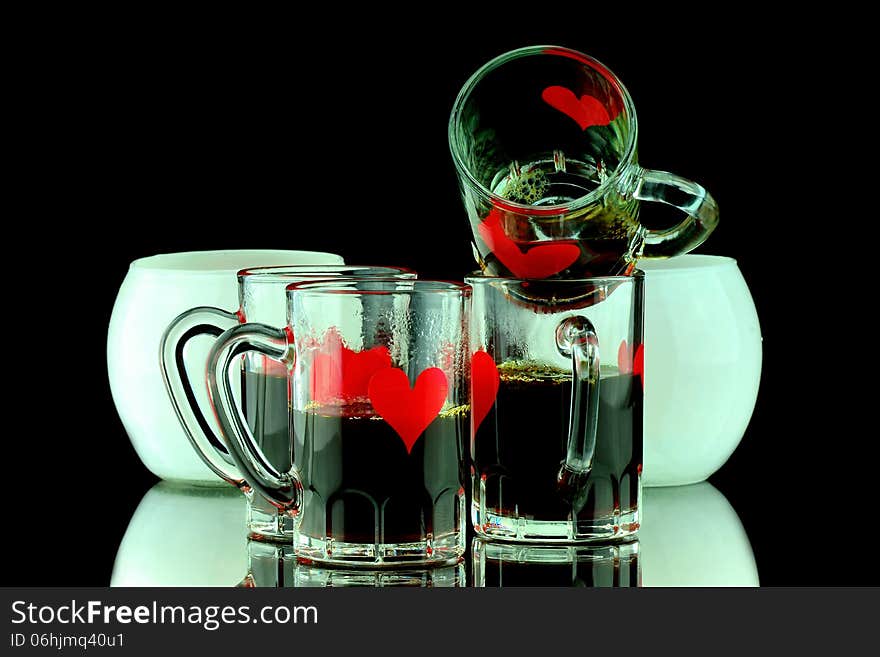 Coffee shots of whiskey in glass with hearts. Coffee shots of whiskey in glass with hearts