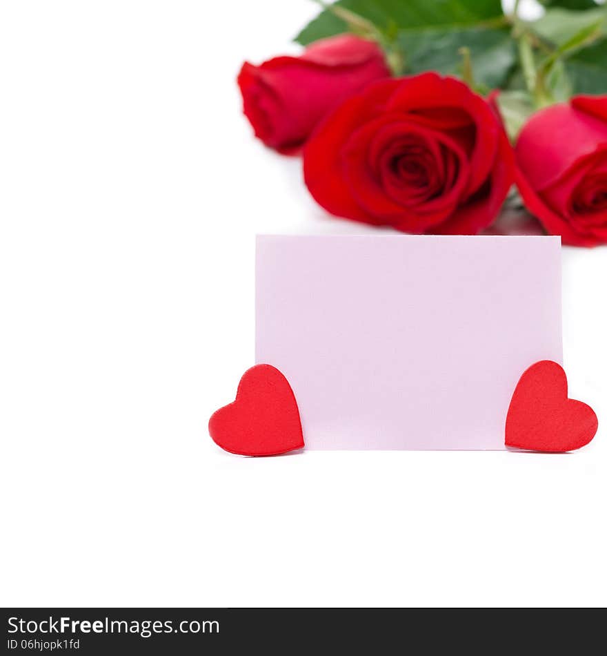 Pink card for greetings, hearts and red roses, isolated on white