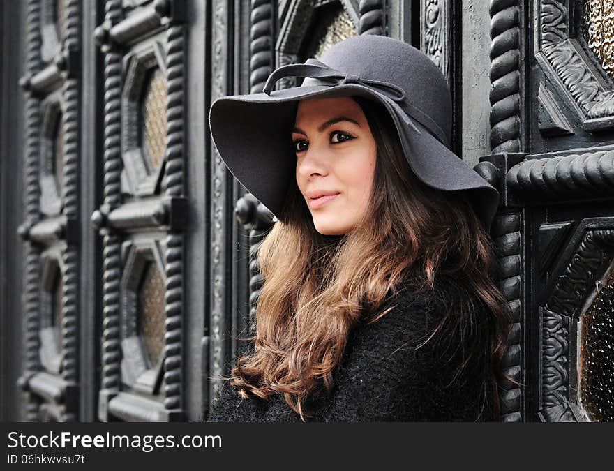 Smiling girl. Portrait of elegant brunette woman with hat. Smiling girl. Portrait of elegant brunette woman with hat.