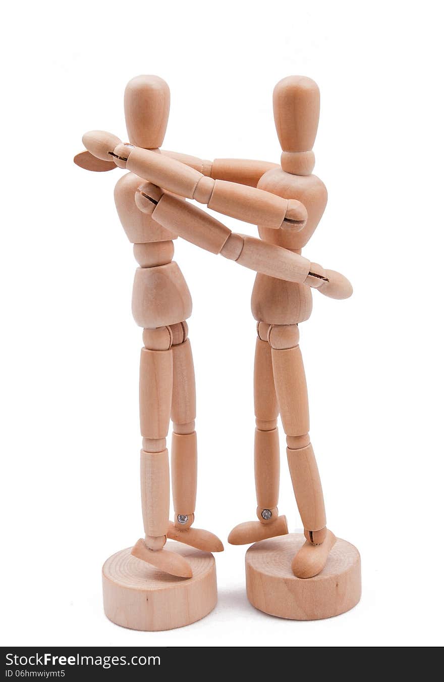 Wooden model couple embrace. Wooden model couple embrace.