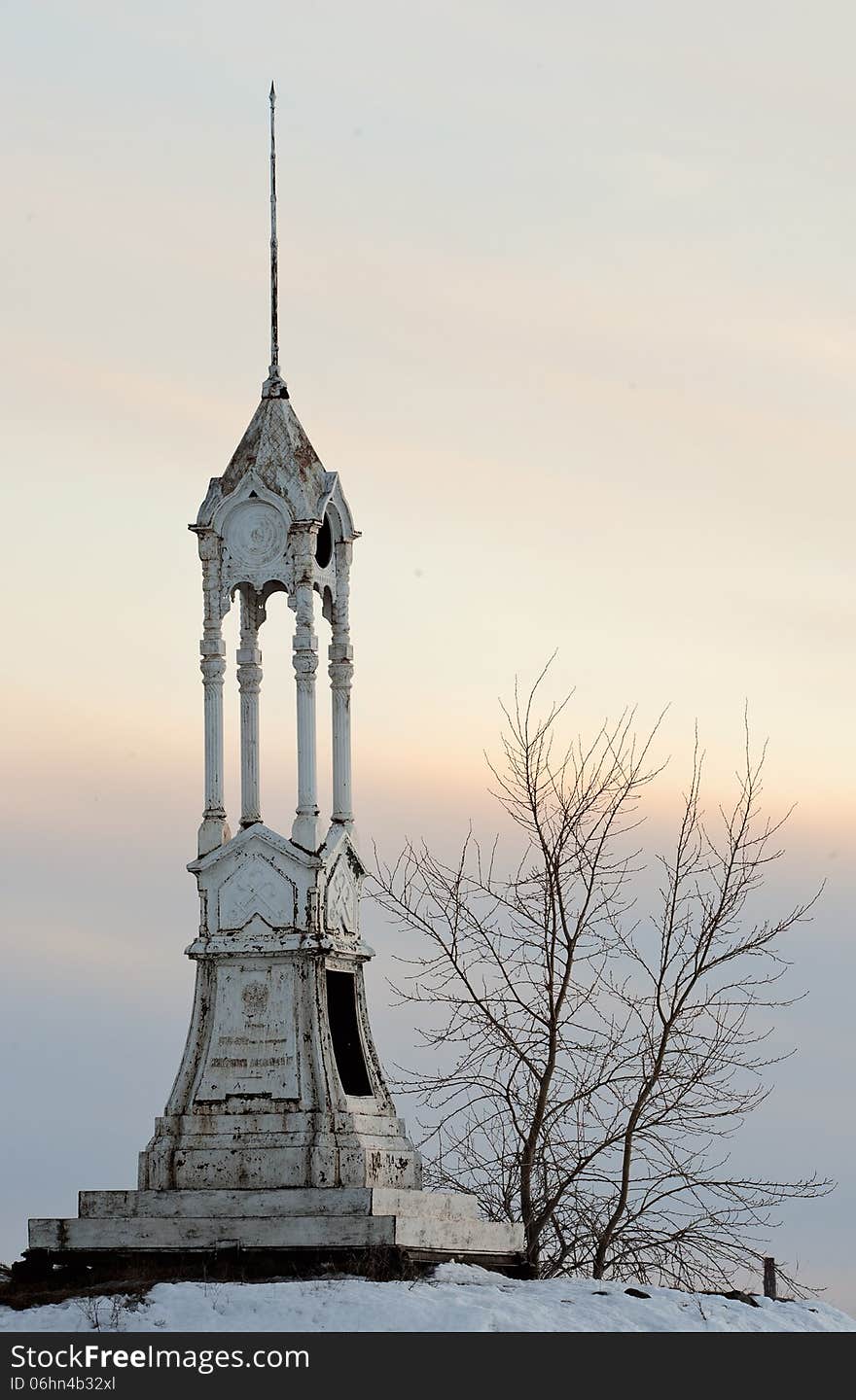 Aged iron beacon in the winter