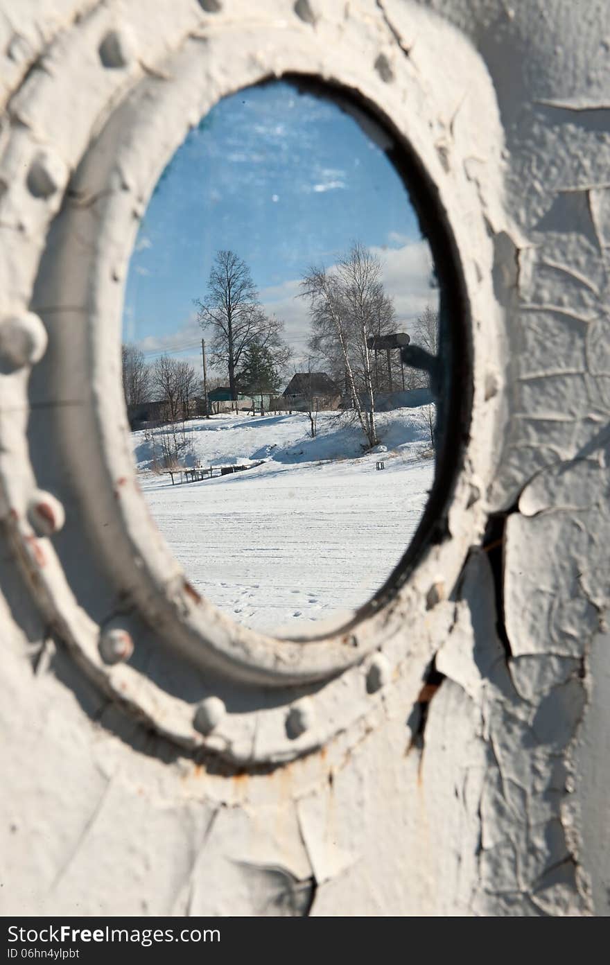 Frozen Porthole On The White Ships Wall.