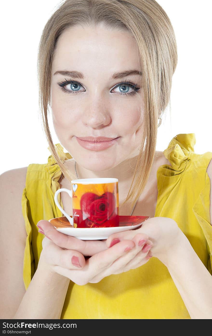 Woman offering a cup of coffee on a plate