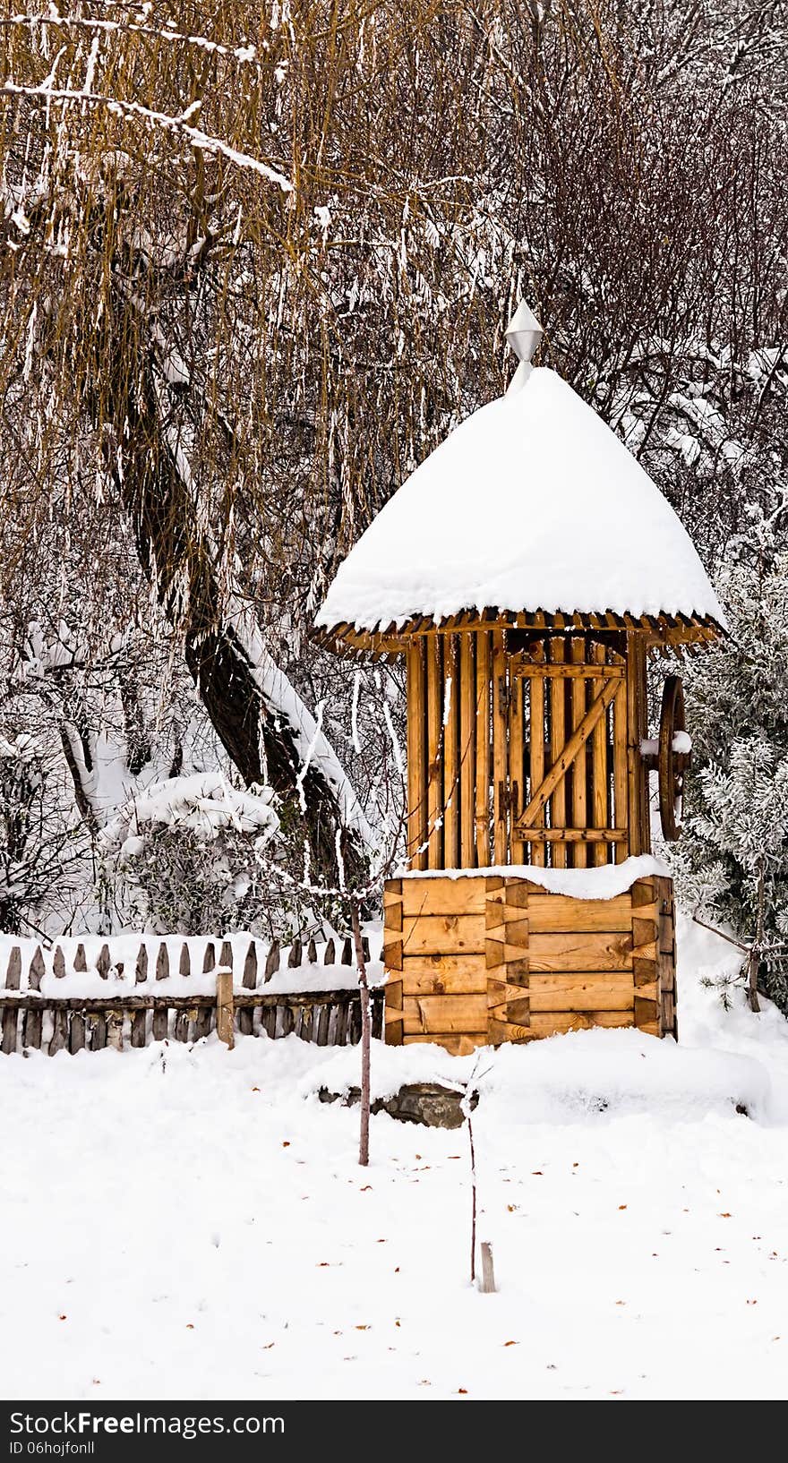 Fountain covered with snow. Fountain covered with snow.