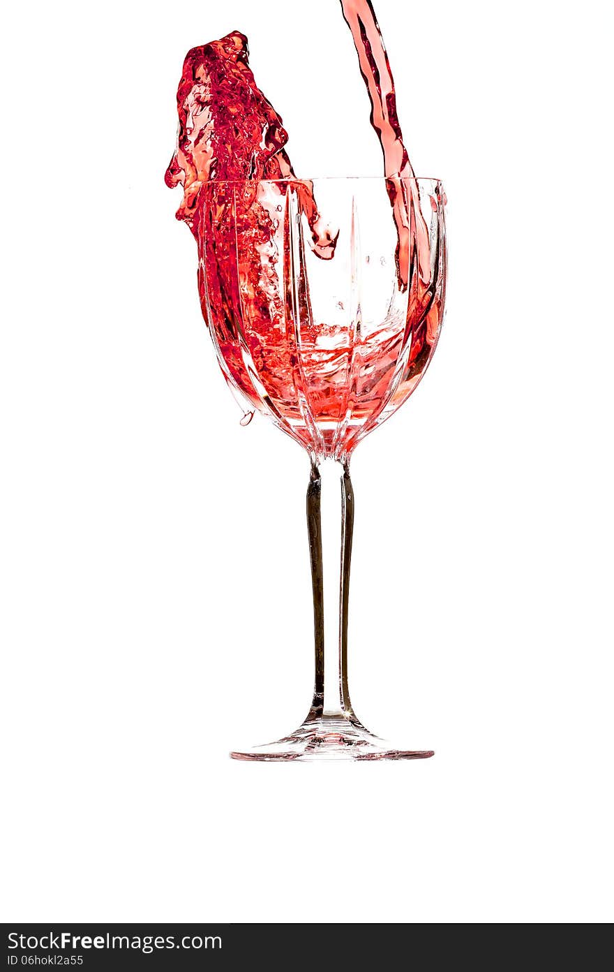 Red wine splashing in crystal glass. Red wine splashing in crystal glass