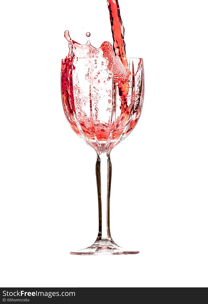 Red wine splashing in crystal glass. Red wine splashing in crystal glass