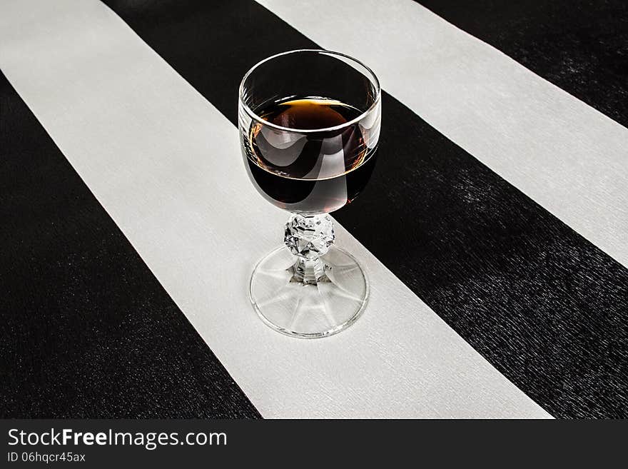 Glass of brandy on the original background