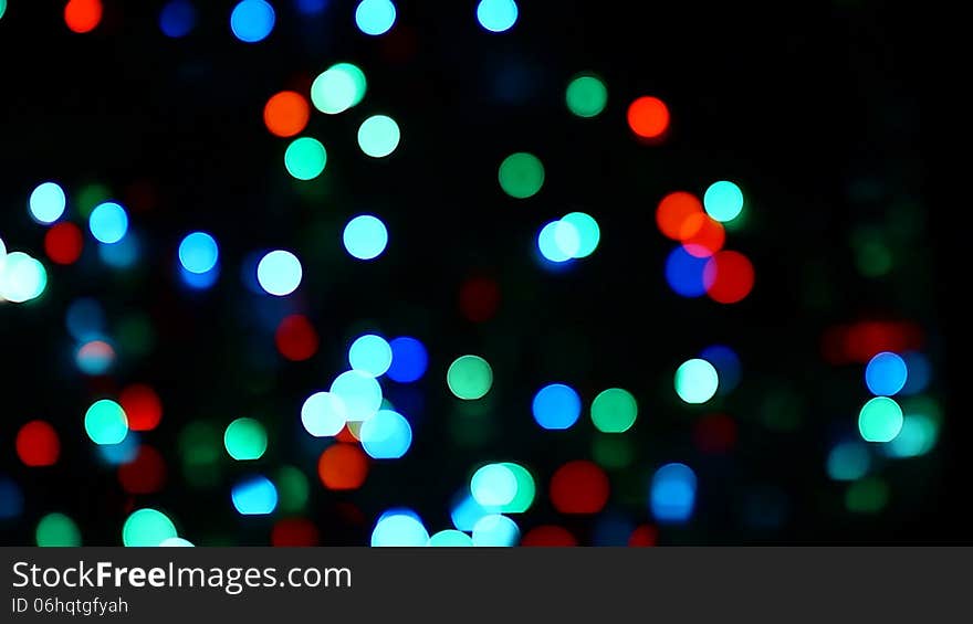 Video of Christmas lights with different color out of focus