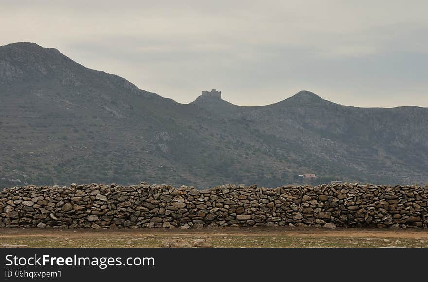 Sicily landscape, stone wall and fortress. Sicily landscape, stone wall and fortress