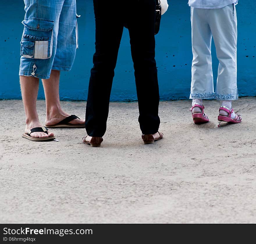 Feet of the man, woman and child. Feet of the man, woman and child